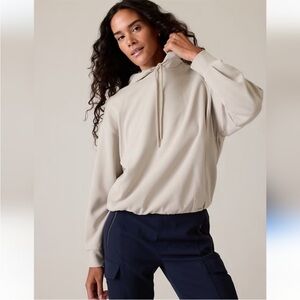 Athleta Women’s Medium, Seasoft Bubble Hem Hoodie in Abalone (cream).